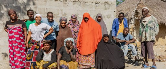 Community members from Cabaceira Pequana of Mossuril district in Mozambique gather for a community engagement meeting.
